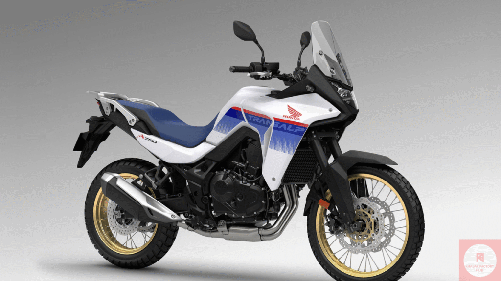 Honda Transalp XL750 adventure touring motorcycle standing on a rugged mountain trail with scenic background